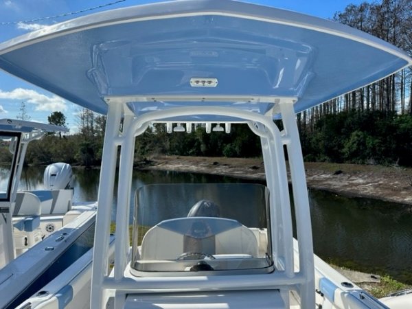 Generally, a Sportfisherman will be a large craft with a fly bridge and outriggers designed to pursue big game fish.  These will be 35 feet up in length and contain all of the amenities to handle heavy blue water.