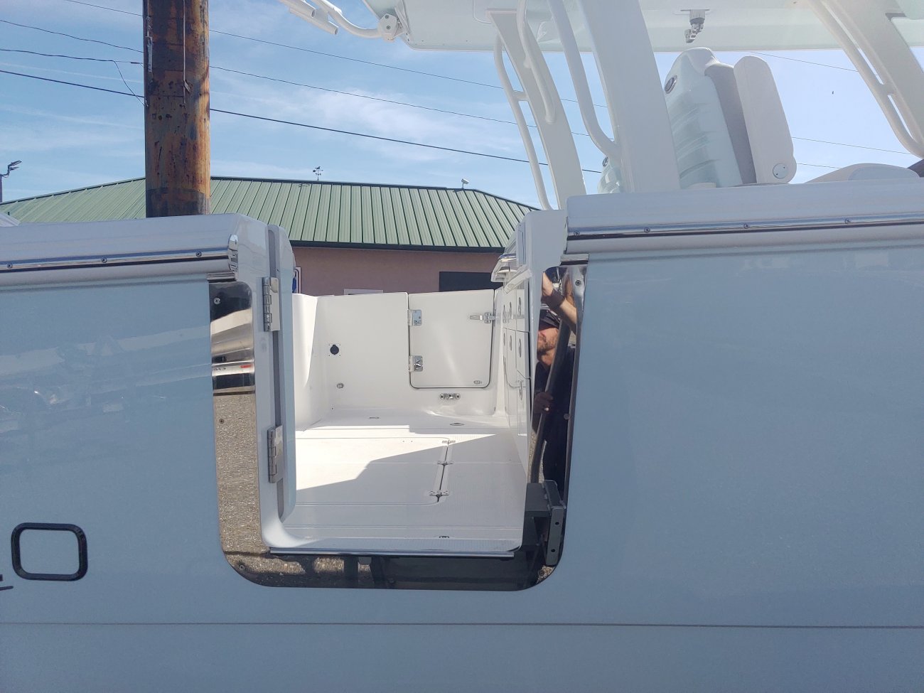 The definition of an outboard motor is a detachable engine mounted on outboard brackets on the stern of your boat.  This configuration will have twin engines.