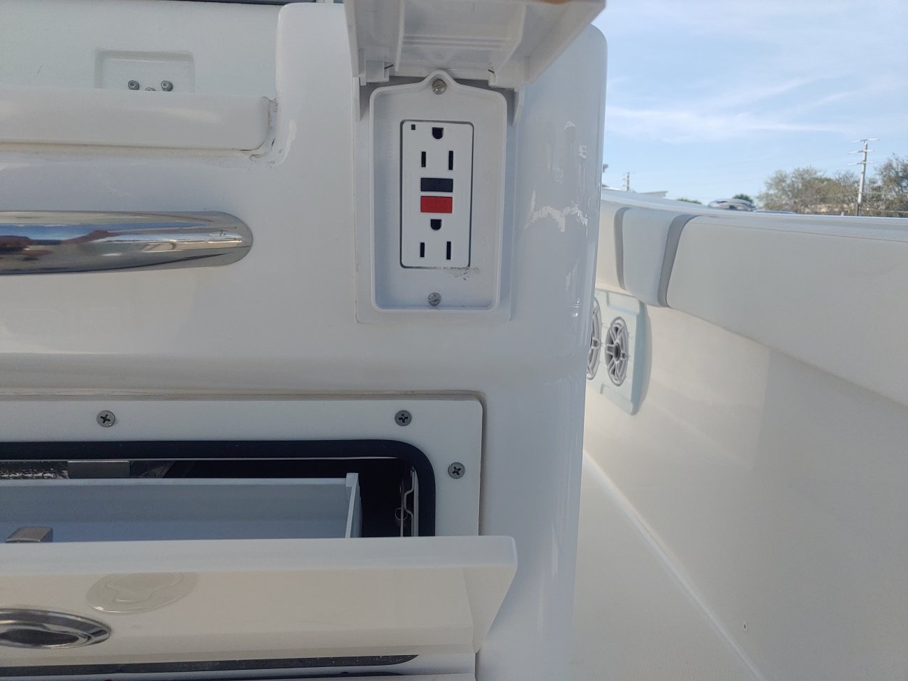 The definition of an outboard motor is a detachable engine mounted on outboard brackets on the stern of your boat.  This configuration will have twin engines.