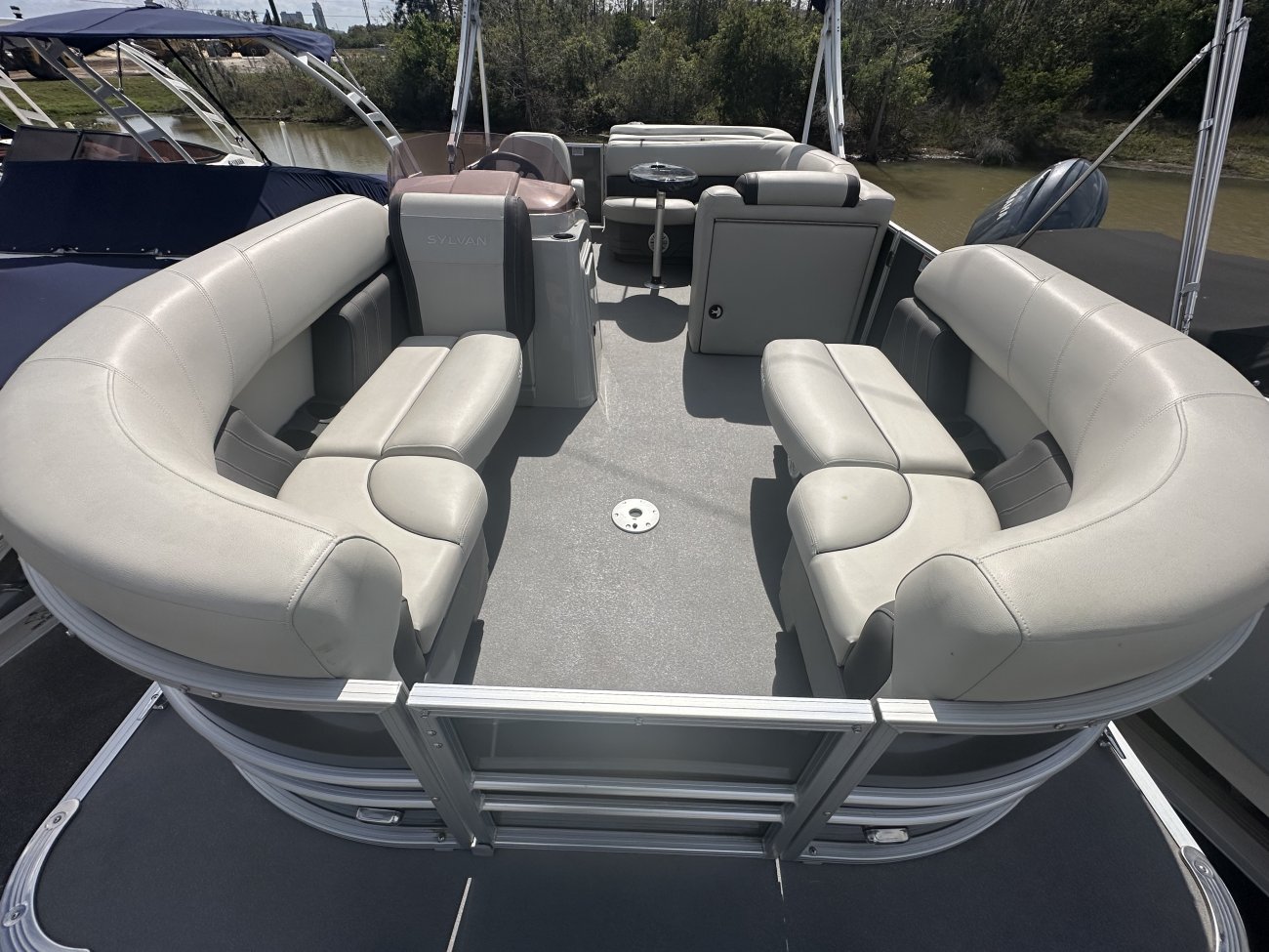 A pontoon boat is constructed from closed cylinders that support a platform. They offer the best value in terms of capacity to price. As a result pontoons are typically purchased for pleasure boating rather than serious fishing.