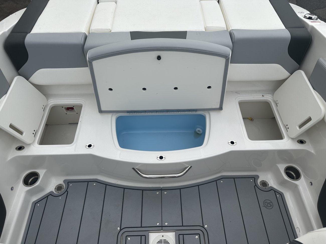 A dual console boat is typically one that was designed for salt water fishing and has the console split around a center walk thru to the bow.  The helm is usually starboard while there is passenger seating to port.